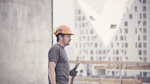 Craftsman with helmet on building site