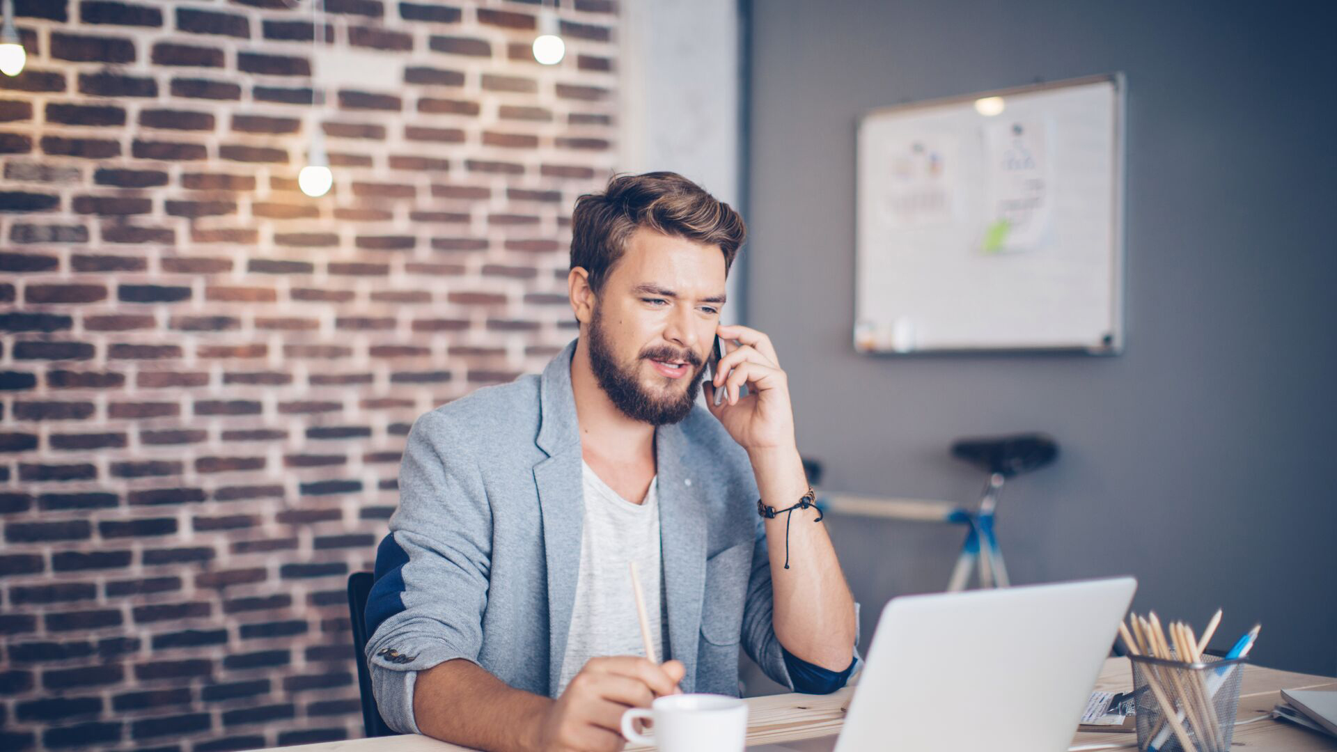 Man in modern office space.