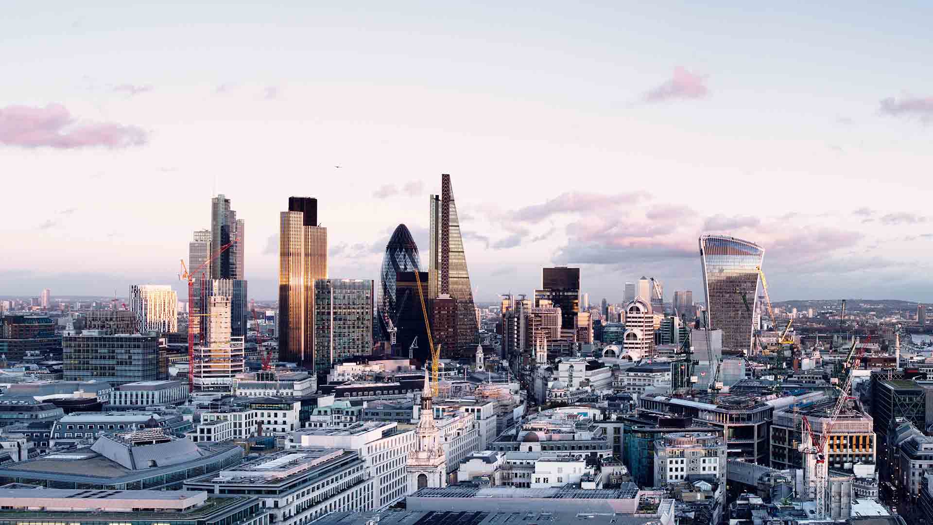 Image of the London city skyline at sunset