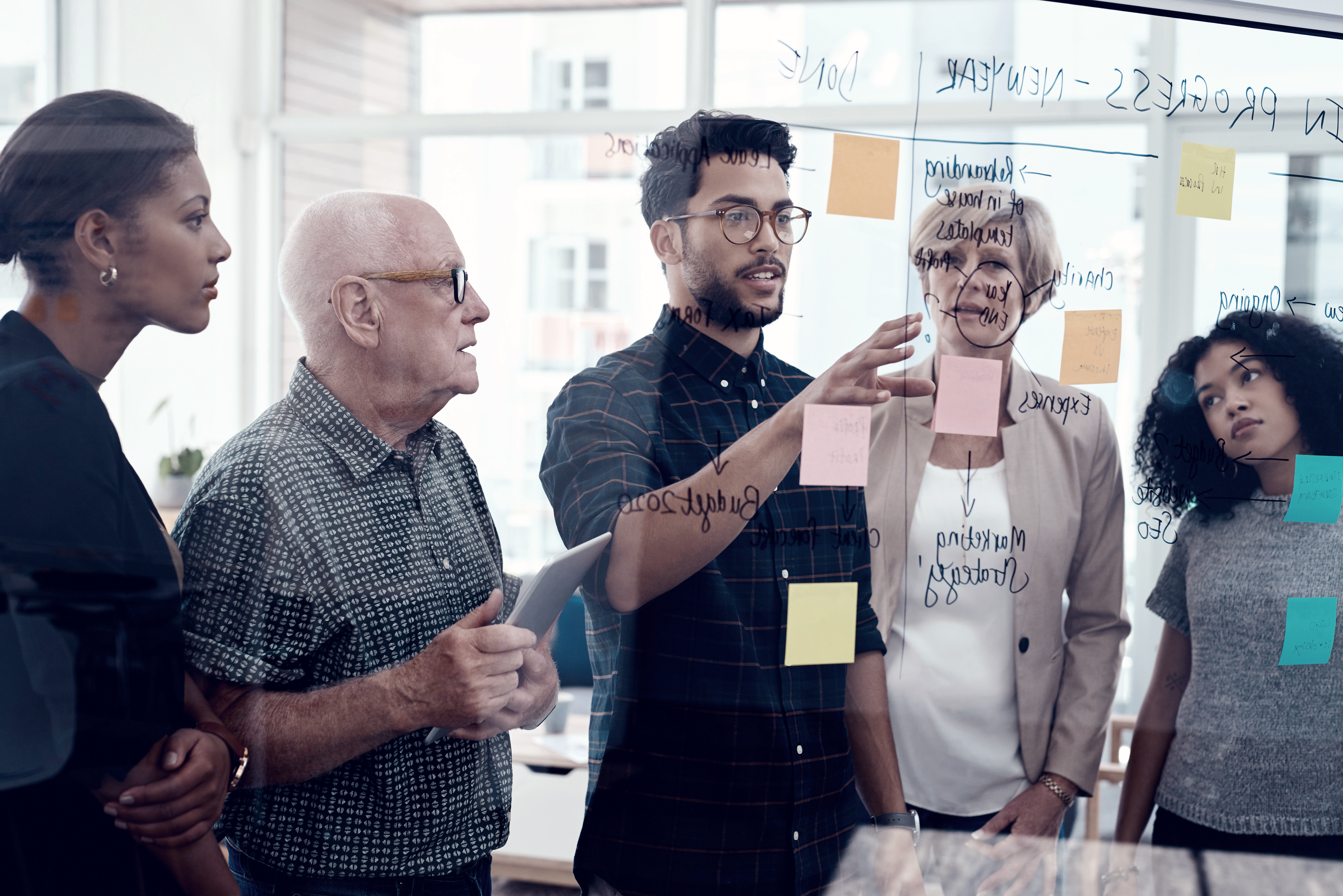 Team work at post-it wall