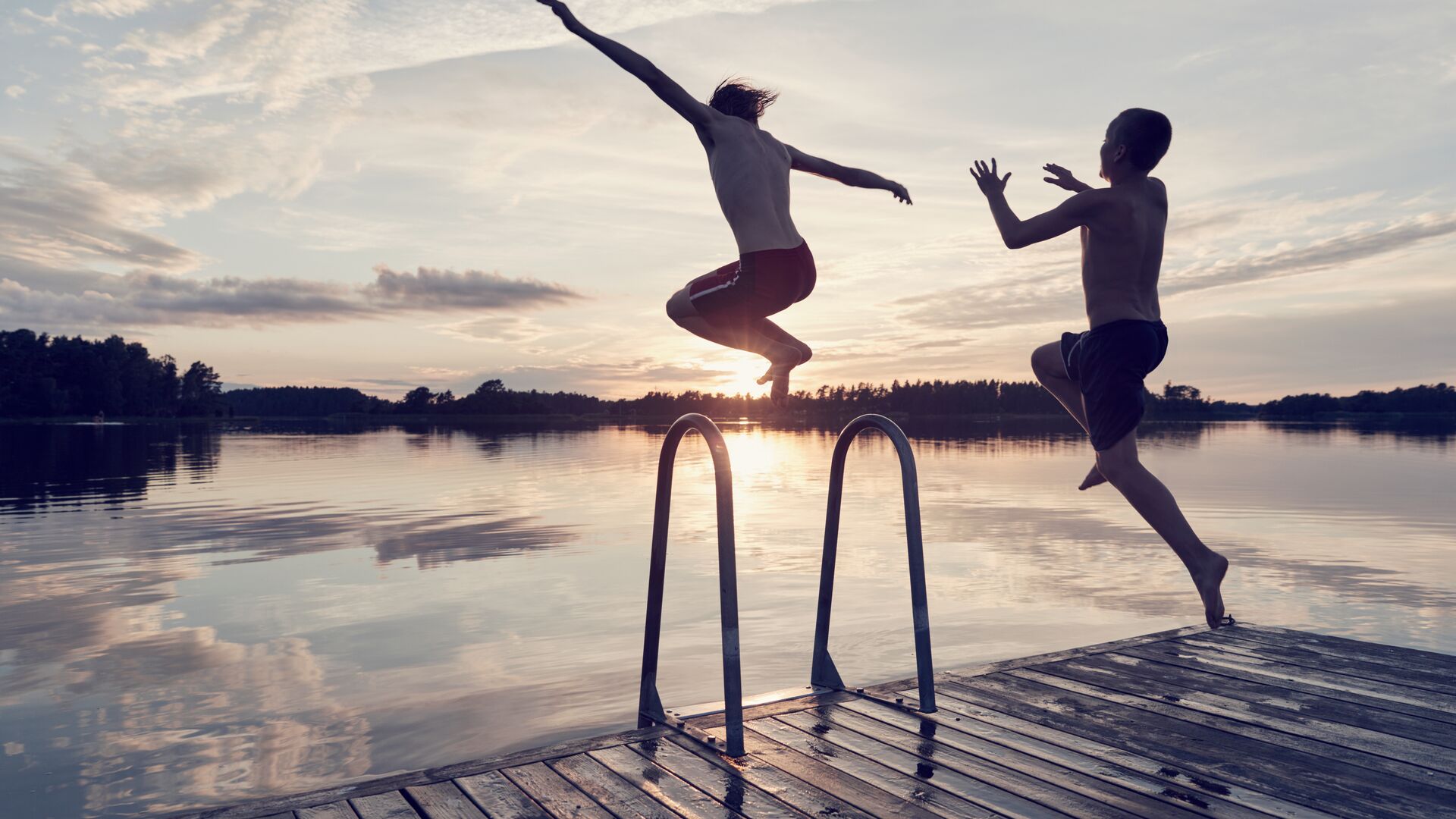 People jumping from bridge