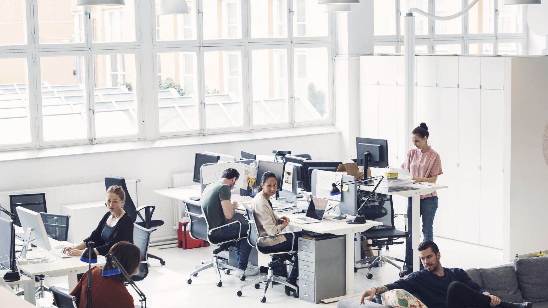 People in an open-plan office