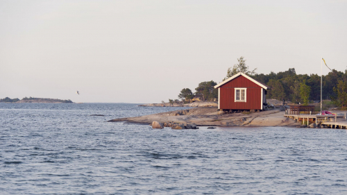 Sunset on a cute little cottage in the archipelago