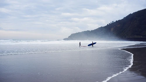 Two surfers at the beach