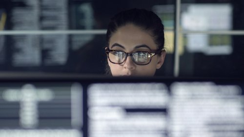  Woman monitors data 