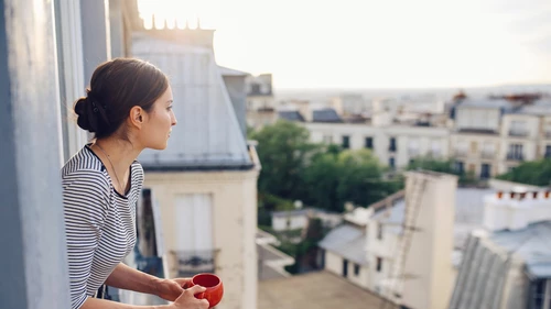 Young woman in Parisian apartment