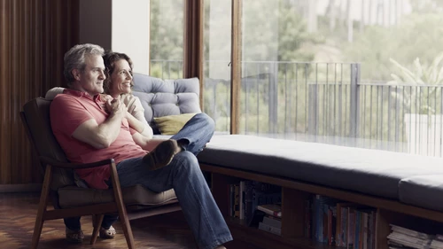 Thoughtful mature couple at home