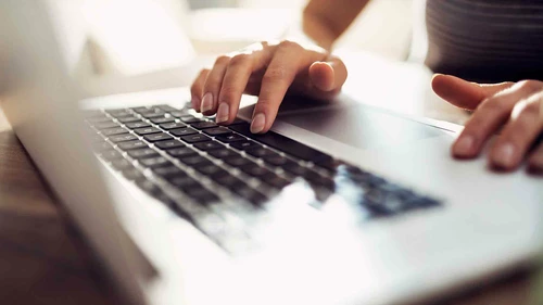 Woman doing work on a computer