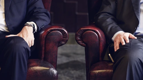 Businessmen sitting in sofa