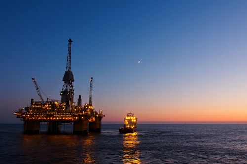 sunset-behind-an-oil-platform-nordea-on-your-mind
