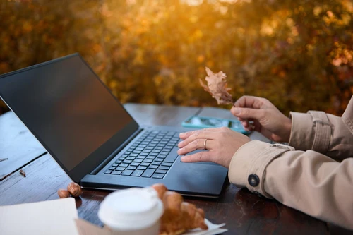 Person typing on laptop