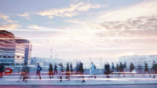 Business-people-walking-through-the-city-at-dawn