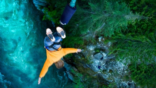 man-jumping-from-cliff