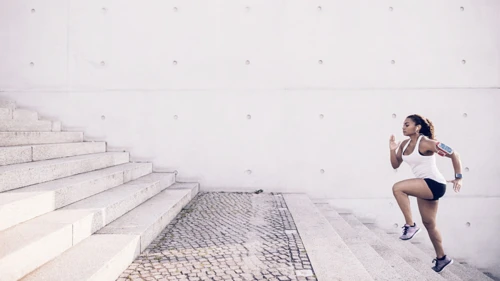 running woman up for stairs