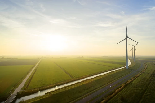 GettyImages-1129092268_road_windmills_1920x1280-1536x1024.jpg