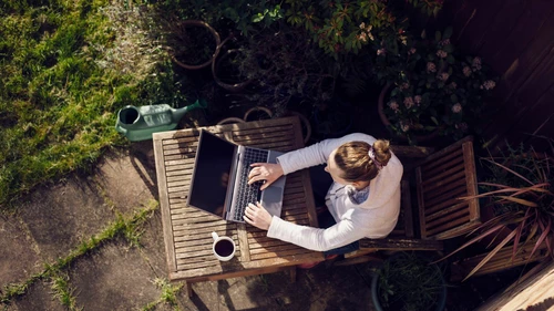 Woman working from home in her garden