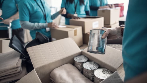 Volunteers packing humanitarian aid