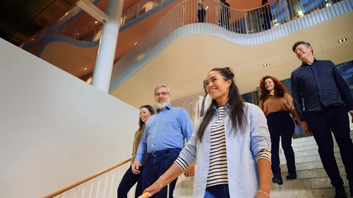 people walking down the stairs