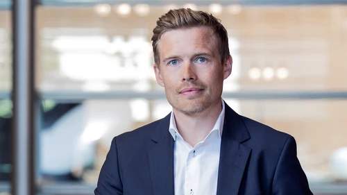 Juho Kostiainen, Ekonomisti