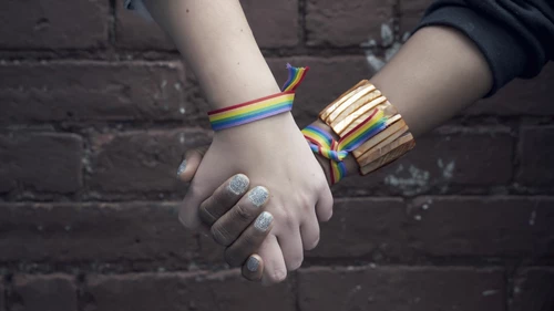 Couple holding hands