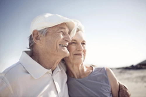 Old couple on beach