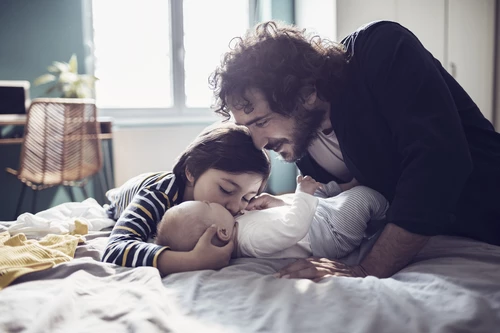 Father playing with his kids