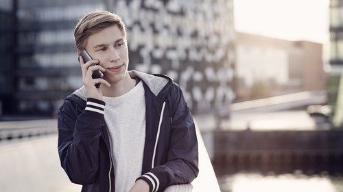 young-man-talking-on-phone