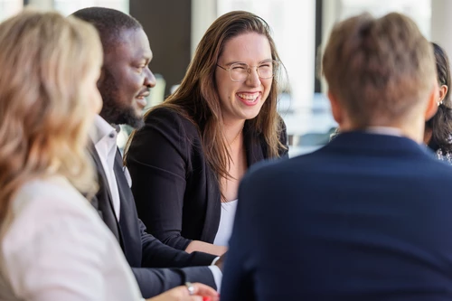 Group of people discussing at the office