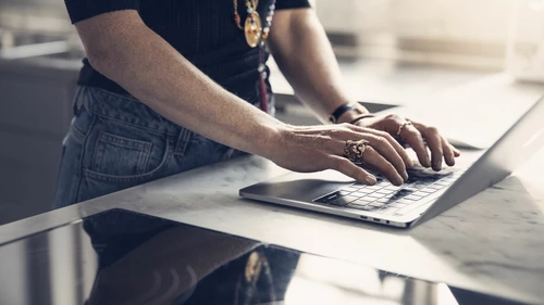 woman-writing-on-laptop