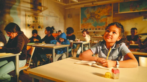 Girl in classroom table