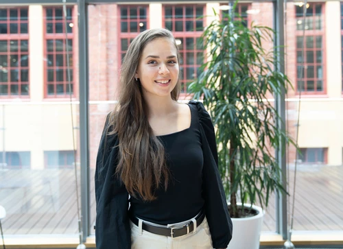 Young women standing at the office