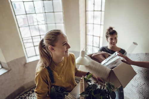 Two students moving into new home