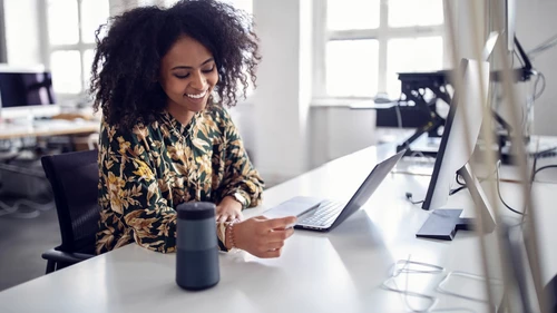 Woman doing online shopping on her laptop