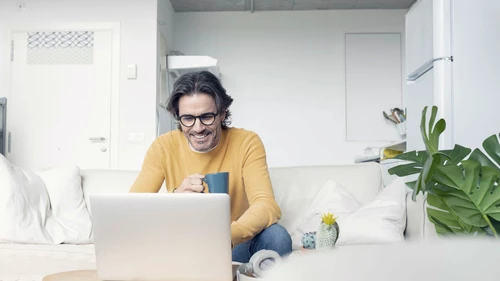 Happy man working from home
