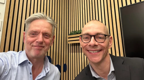 Helge J. Pedersen and Michael Borre in a podcast studio