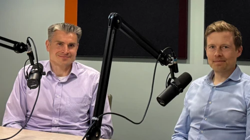 Jan Von Gerich and Juho Kostiainen sitting in the podcast studio.