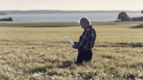 Farmer using technology to monitor his crops