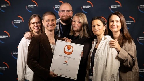 Group of people looking at camera
