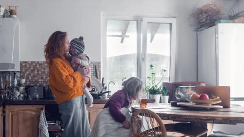 family-in-warm-clothes-at-home-in-an-energy-crisis