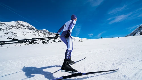 Man skiing in a snowy landscape. 