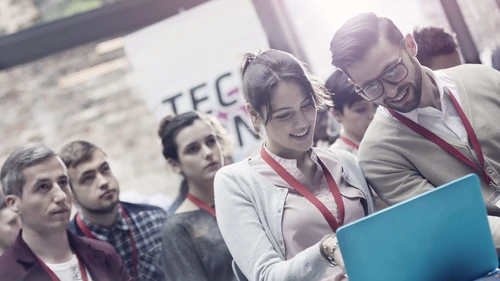 Young adults at a tech conference 
