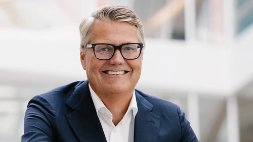 Peter Dalmalm smiling to the camera.