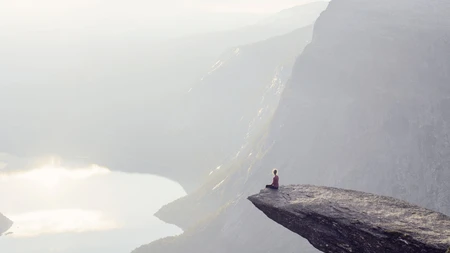 woman-sitting-on-the-edge-of-a-cliff-flipped.jpg