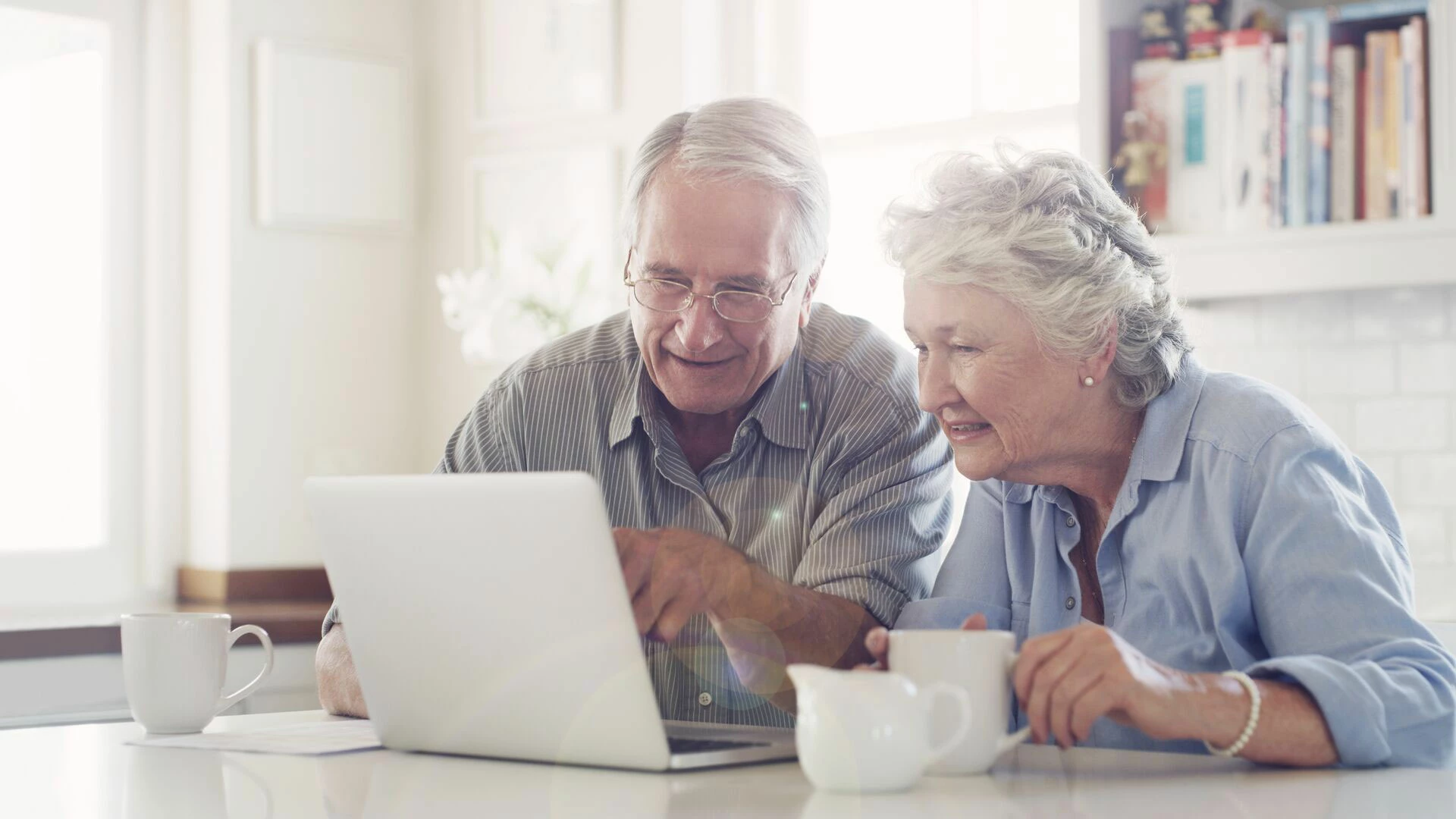 senior-couple-using-a-laptop-together-at-home