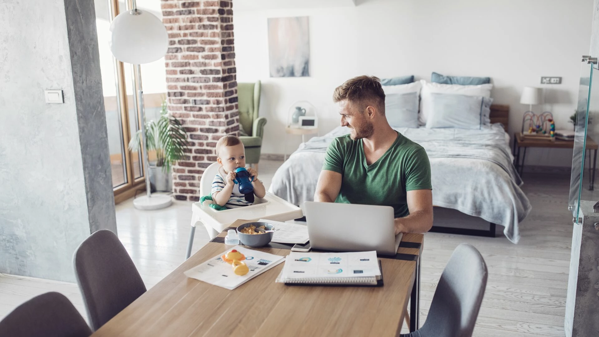 Father and baby in living room
