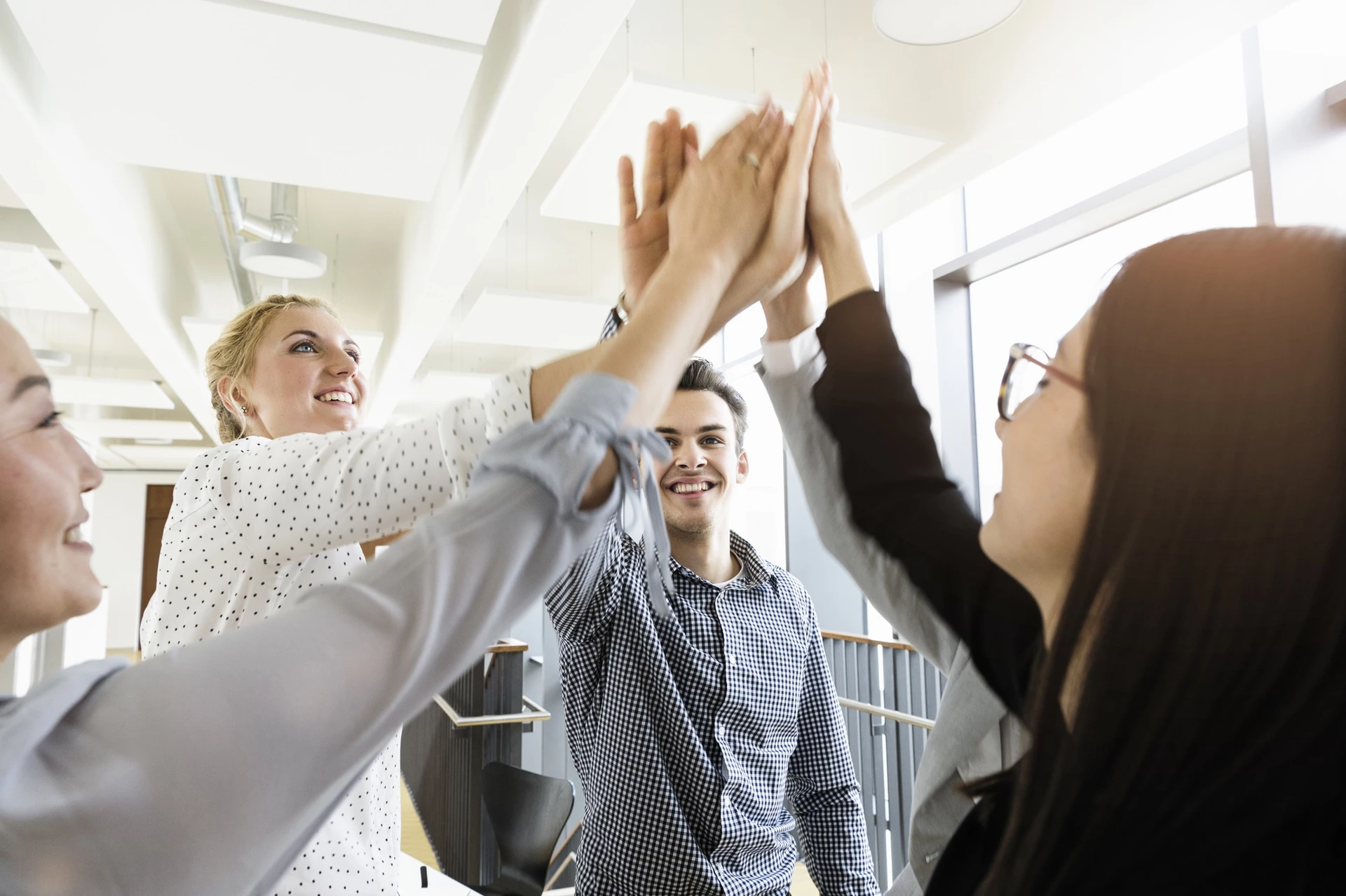 Colleagues celebrating in an office