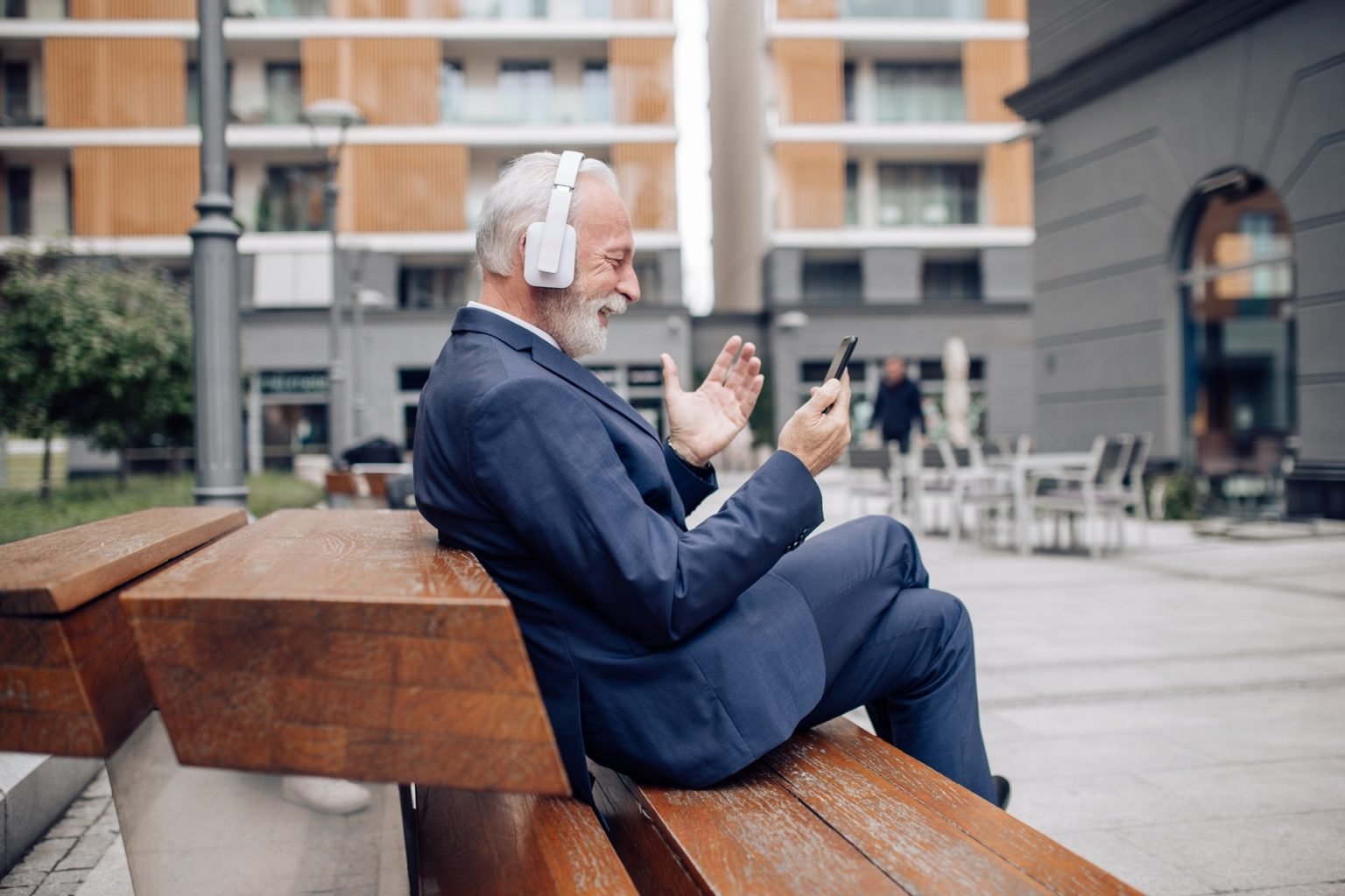 Older man looking at phone