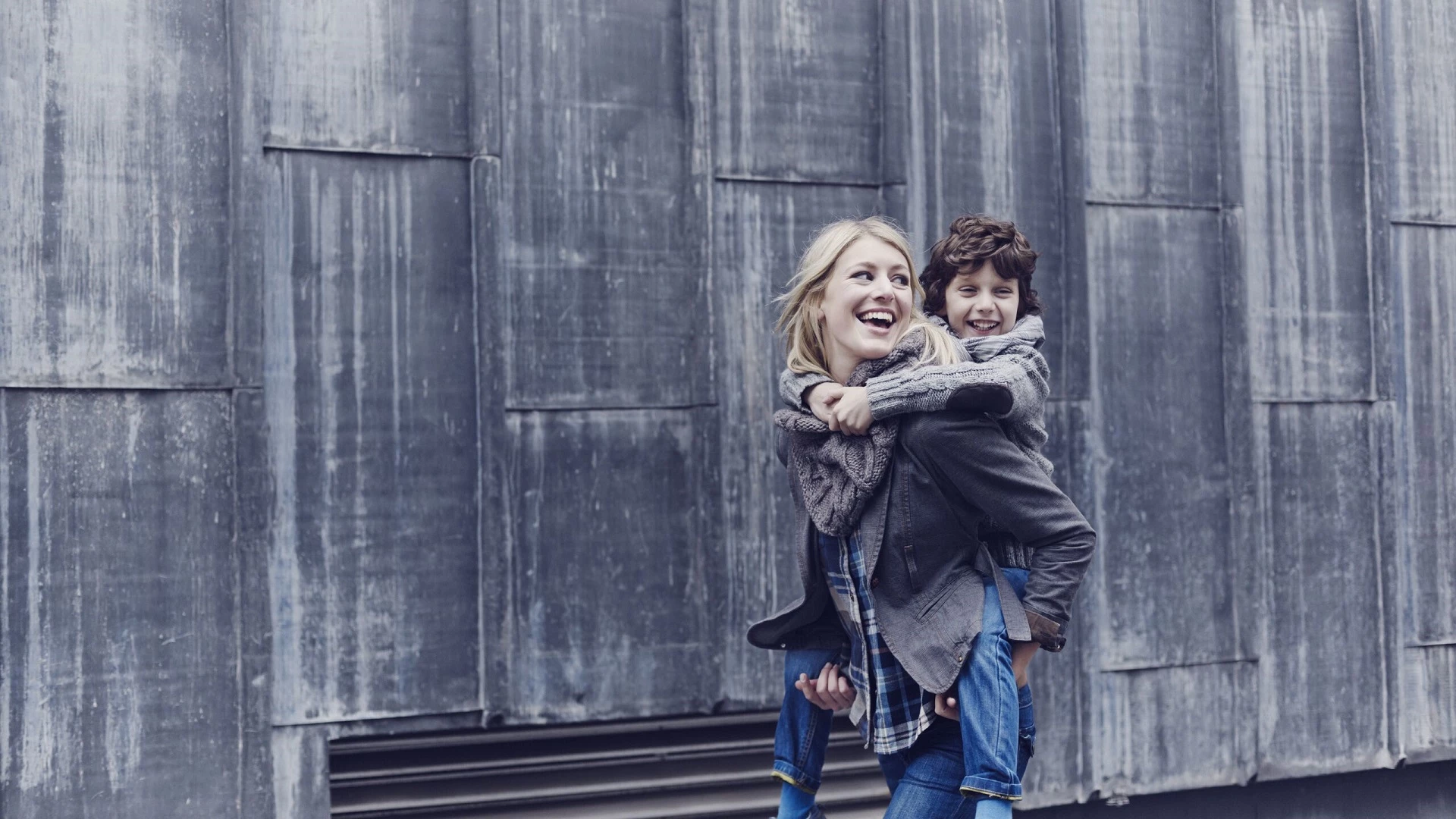 Woman carrying child 
