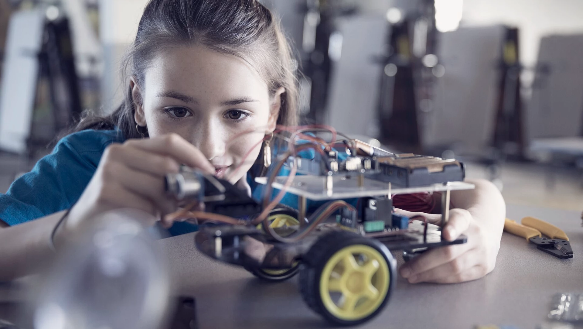 Young girl building