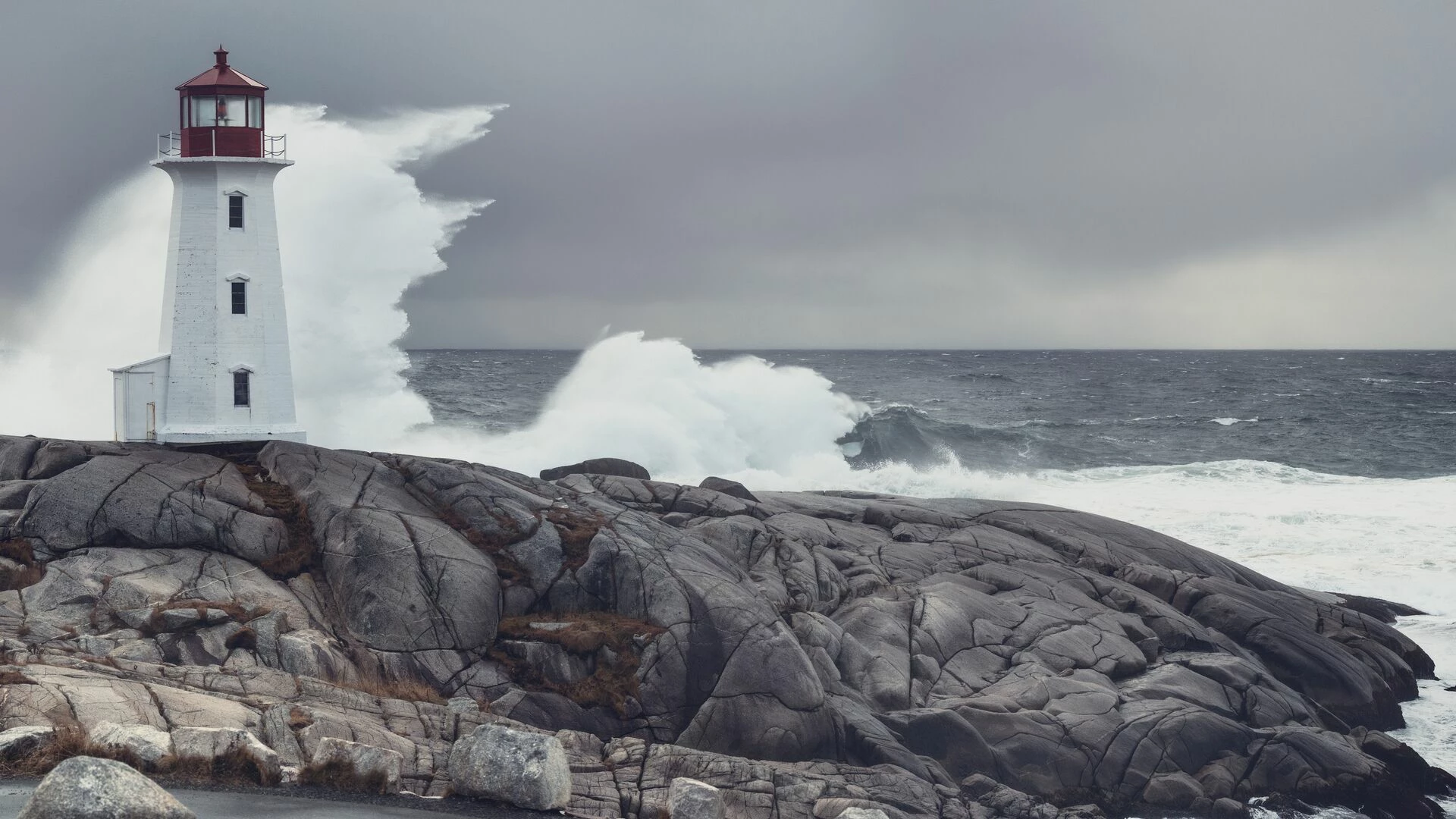 Water splashing against lighthouse
